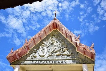 culture stone carving on temple wall.