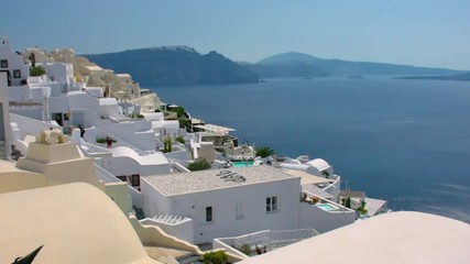 Wall Mural - Santorini, Greece. Picturesque view of traditional cycladic Oia Town Santorini`s houses on cliff