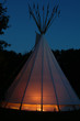 a teepee or tipi in  twilight