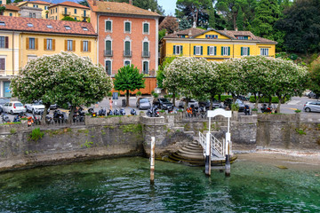 Bellagio city shore with people and parked cars