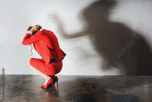 Fotomural Depression or burnout at the workplace, symbolic picture