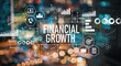 © Tierney - Financial growth with blurred city abstract lights background
