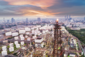 Poster - Oil refinery factory with beautiful sky at dusk for energy or gas industry or transportation background.