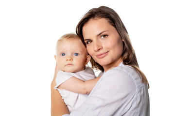 A mother holdng his baby on studio white background