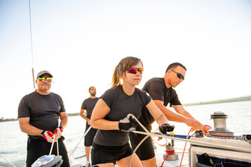 Wall Mural - Team athletes Yacht training for the competition