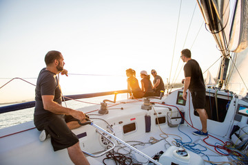 Wall Mural - Team athletes Yacht training for the competition