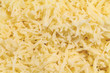 Cheese grated fresh edam close-up without other products.