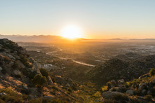 Los Angeles Sunrise View Of Porter Ranch And The 118 Freeway In The San Fernando Valley.  The San Gabriel Mountains, Burbank And North Hollywood, California Are In The Background.  