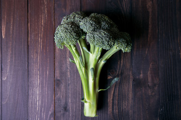 Broccoli on wooden background