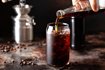 Wall Mural - Cold brew iced coffee in glass bottles