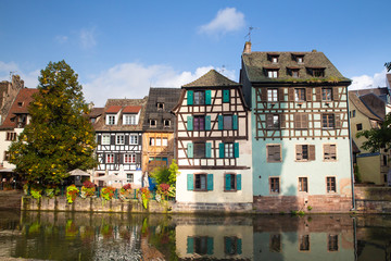 Canvas Print - View of beautiful half-timbered houses along the canal seen from Strasbourg France