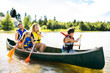 © Louis-Photo - Family in a Canoe on a Lake having fun