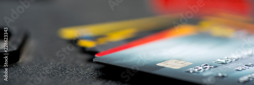 Credit and debit card. Modern spending - panoramic Tableau sur Toile
