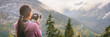 Travel tourist woman photographer taking pictures with video camera of nature landscape Alaska background, panoramic banner.
