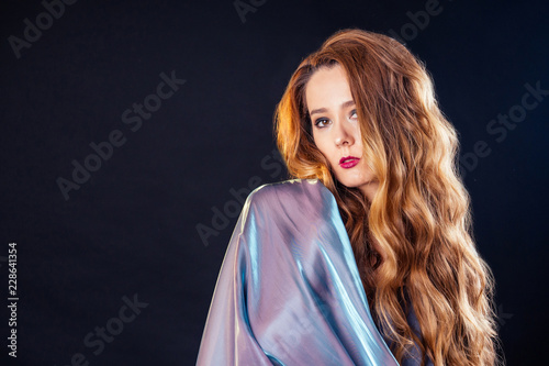 Portrait Of A Young Woman In Windy Blue Dress Beautiful Girl With