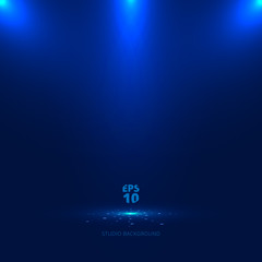 Wall Mural - blue stage background with light rays of spotlight and falling sparkling.