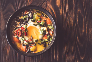 Wall Mural - Soup of black beans and an egg