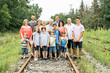 © Louis-Paul Photo - Large family with cousin grandparent father and kid on a forest