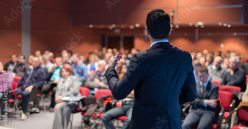 Fotomural Speaker giving a talk on corporate business conference