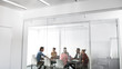 © LUMINA IMAGES - Group of young businesspeople having a meeting at meeting room.