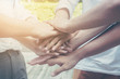 © Monster Ztudio - Team teamwork business join hand together concept. Power of male and female volunteer charity work. Success business startup