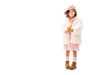 Wall Mural - adorable happy child in stylish clothes with ice cream looking at camera isolated on white