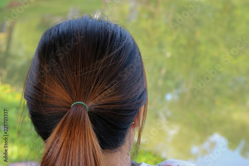 Backside Head Of Asian Woman Who Has Brown Color Highlight