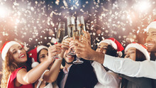 Diverse Friends Clinking With Champagne Glasses On New Year's Eve