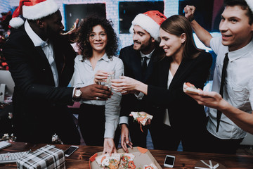 Wall Mural - Young People Celebrating New Year in Modern Office