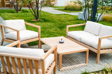 Fototapeta  - Outdoor patio with wooden armchairs and table
