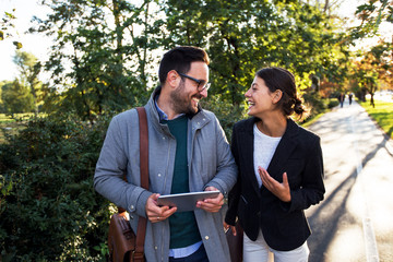 Businessman and businesswoman discussing about new business strategy