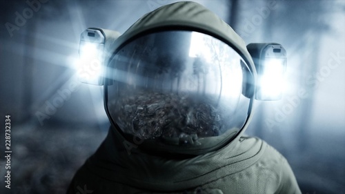 Astronaut in fog night forest Obraz na płótnie
