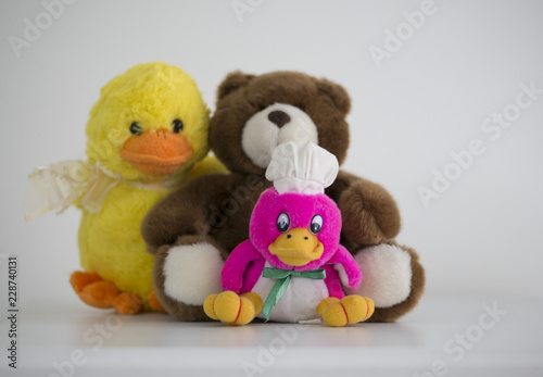 Fotografie, Obraz Teddy plush, yellow gosling plush, pink gosling yellow plush