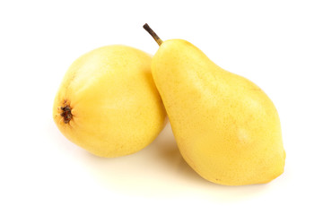 two ripe yellow pear fruits isolated on white background.