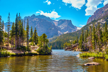 the loch lake in rocky mountains landscape pine trees