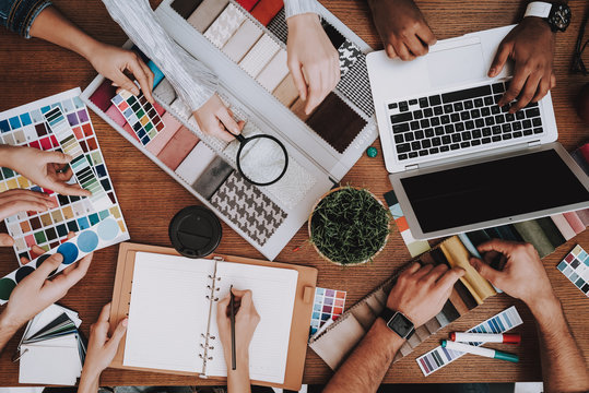 Samples of Color. People. Desk. Vase and Notebook.