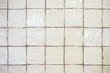 © Surachetsh - white old dirty tile wall in the bathroom, did not clean yet.