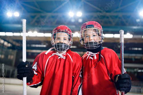 Fototapeta na szkło Ice Hockey - portrait boys players.