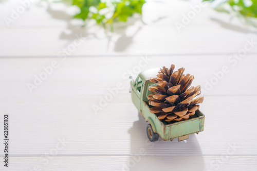 松ぼっくりを載せたおもちゃの車 Buy This Stock Photo And Explore Similar Images At Adobe Stock Adobe Stock