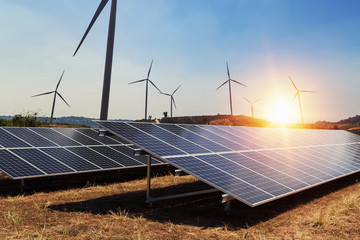 Wall Mural - solar panel with wind turbine and sunlight. clean power energy concept