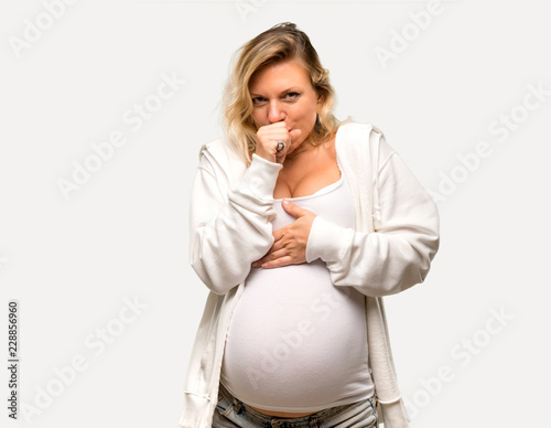 Pregnant blonde woman with white sweatshirt is suffering with cough and  feeling bad on isolated grey background - Buy this stock photo and explore  similar images at Adobe Stock | Adobe Stock