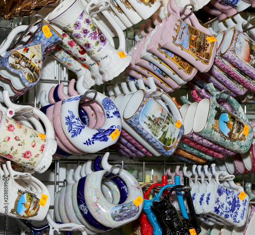 Fotomural Porcelain cups for mineral water in shop window, Karlovy Vary (Carlsbad), Czech