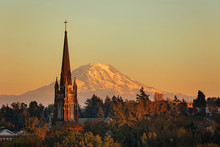 Mt Rainier Towers Behind The Old Church Steeple In Tacoma Washington
