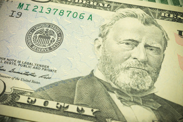 Portrait of Ulysses S. Grant president and Federal Reserve System (FED) seal macro detail on a fifty dollar banknote or bill. Concept of central bank and USA or world economic financial.