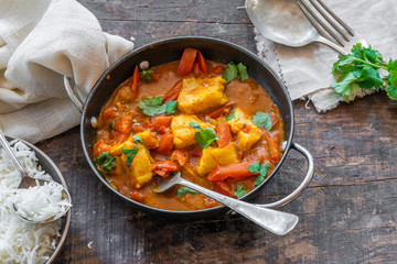 Wall Mural - Fish Mappas - Kerala style coconut fish curry with rice. It's a popular dish in southern Indian state of Kerala. High angle view