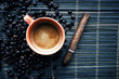 cup of coffe with coffee beans and cigar