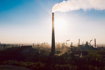 Wall Mural - Industrial landscape with heavy pollution produced by a large factory.