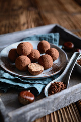 Canvas Print - Chestnut truffles coated with cocoa powder