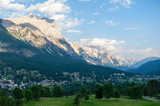 Fototapeta Góry - Mountain slopes along the shoreline of Lake Misurina, in the Italian Dolomites, on a Summer's Afternoon.