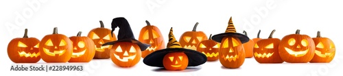 Many Halloween pumpkins on white Fototapeta
